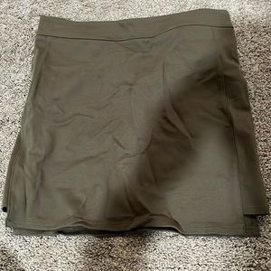 Olive green tight fitted skirt. Worn once and is in perfect condition.